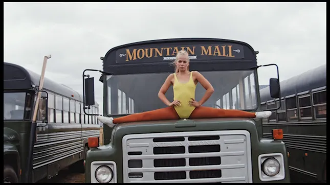 Dancing on a green bus